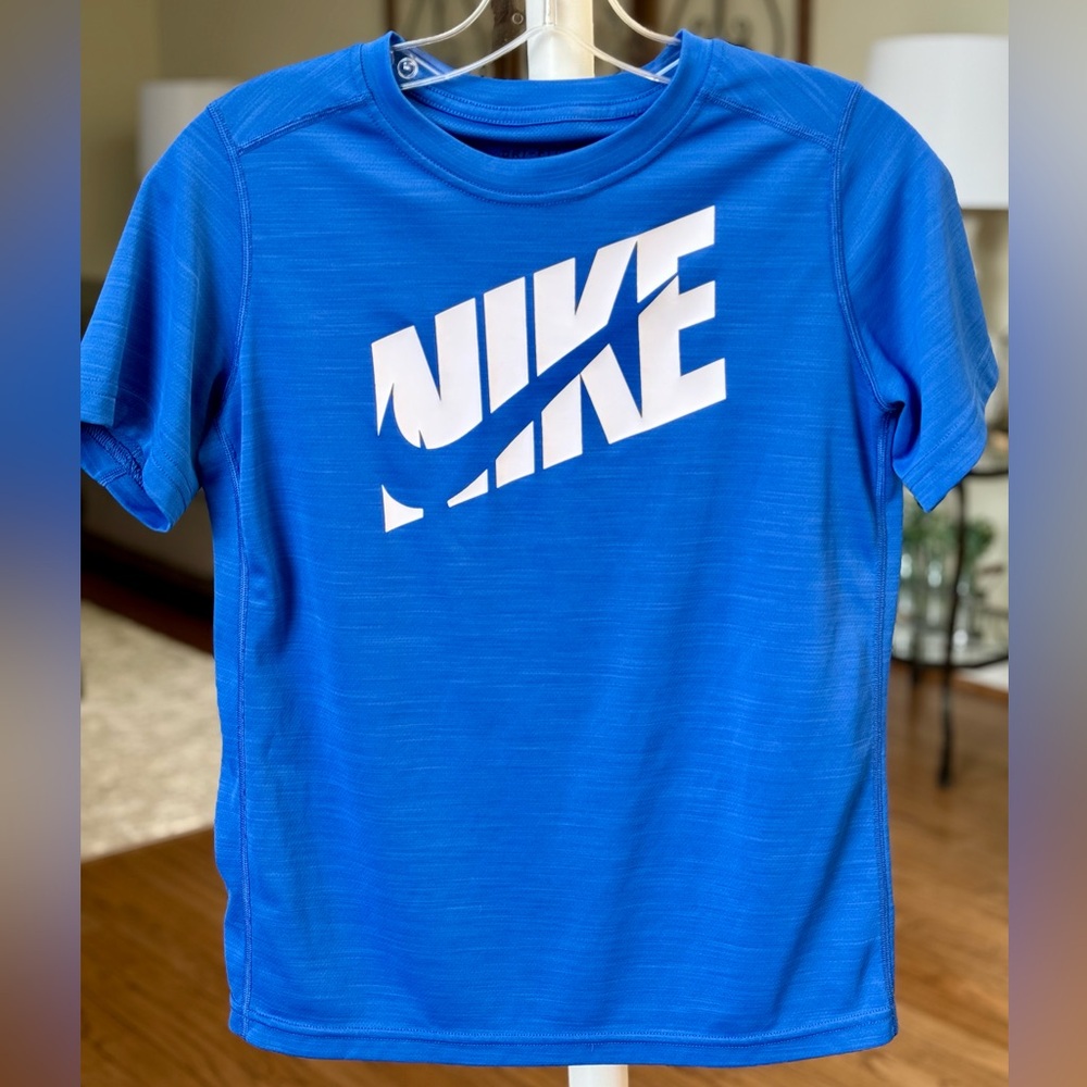 Like New Condition Nike Dri-fit top. Bright royal blue with white Nike logo.